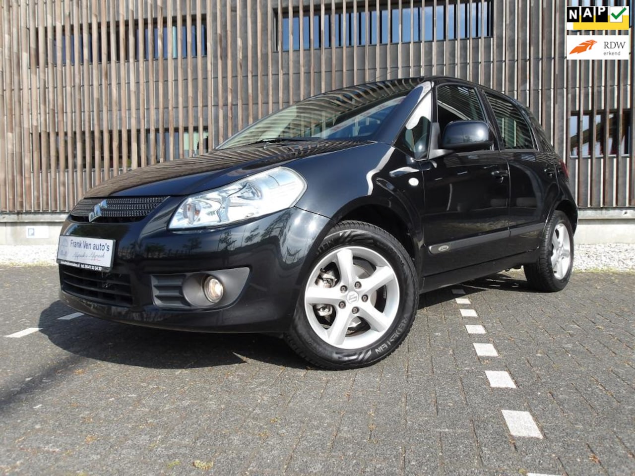 Suzuki SX4 - 1.6 Exclusive/AIRCO/NAVI/KEYLESS/5drs/2e eig/NAP/hoge instap/incl. beurt, airco service, n - AutoWereld.nl