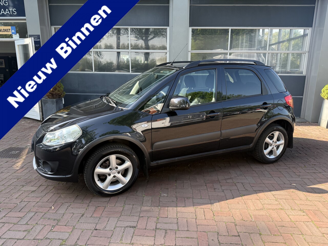 Suzuki SX4 - 1.6 4Grip Exclusive Airco,Trekhaak,Cv,Electr.ramen Bj 2006 Hoge Zit !! - AutoWereld.nl