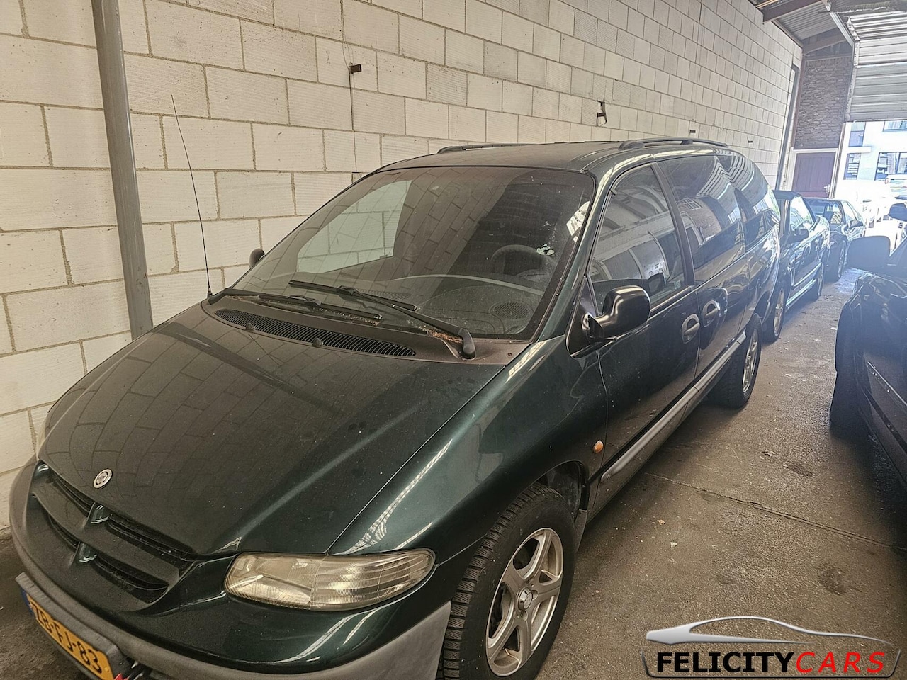 Chrysler Grand Voyager - 2.4i SE Luxe met 116dkm nap - AutoWereld.nl