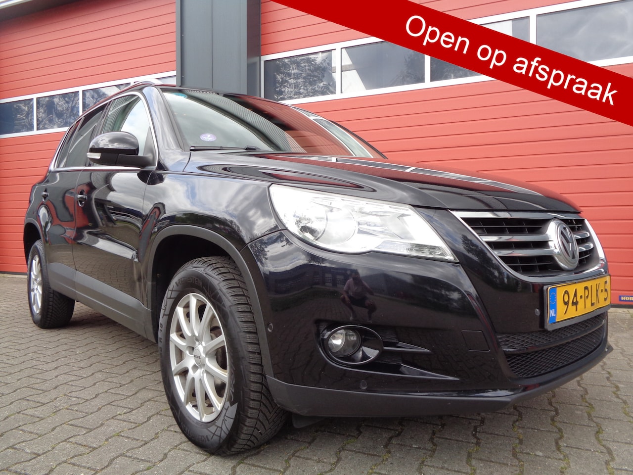 Volkswagen Tiguan - 1.4 TSI Sport&Style 150PK Clima Navi Cruise LMV Leer Trekhaak 6-Bak Nl-Auto 2E-Eigenaar - AutoWereld.nl