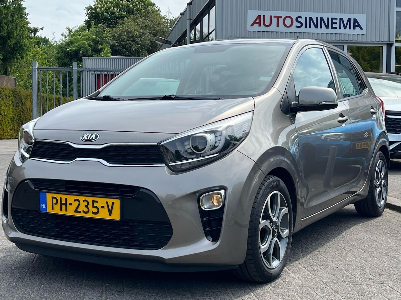 Kia Picanto - 1.0 CVVT First Edition Climate Cruise Navi - AutoWereld.nl
