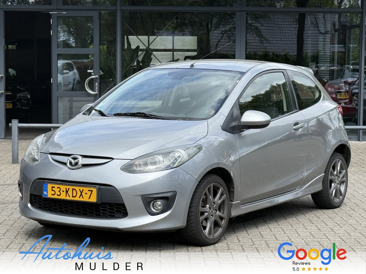 Mazda 2 - 1.3 Kuro Limited Edition Airco/Stoelverwarming/Rechts schade op zij kant - AutoWereld.nl
