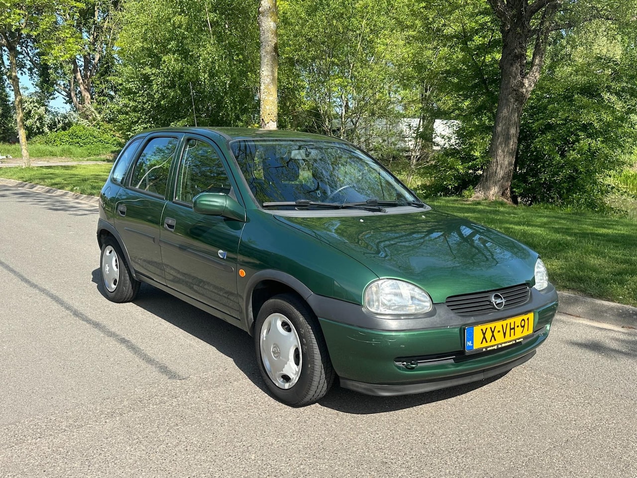 Opel Corsa - 1.2i-16V Strada* 1 Eigenaar* Automaat* Unieke km! - AutoWereld.nl