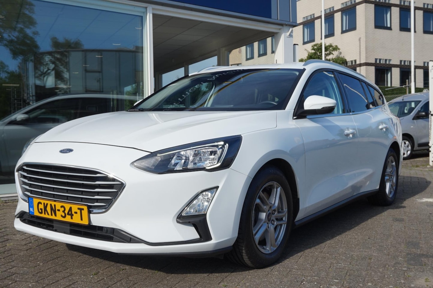 Ford Focus Wagon - 1.0 EcoBoost 125PK Titanium Automaat|Navi|Adapt. Cruise| PDC V+A - AutoWereld.nl