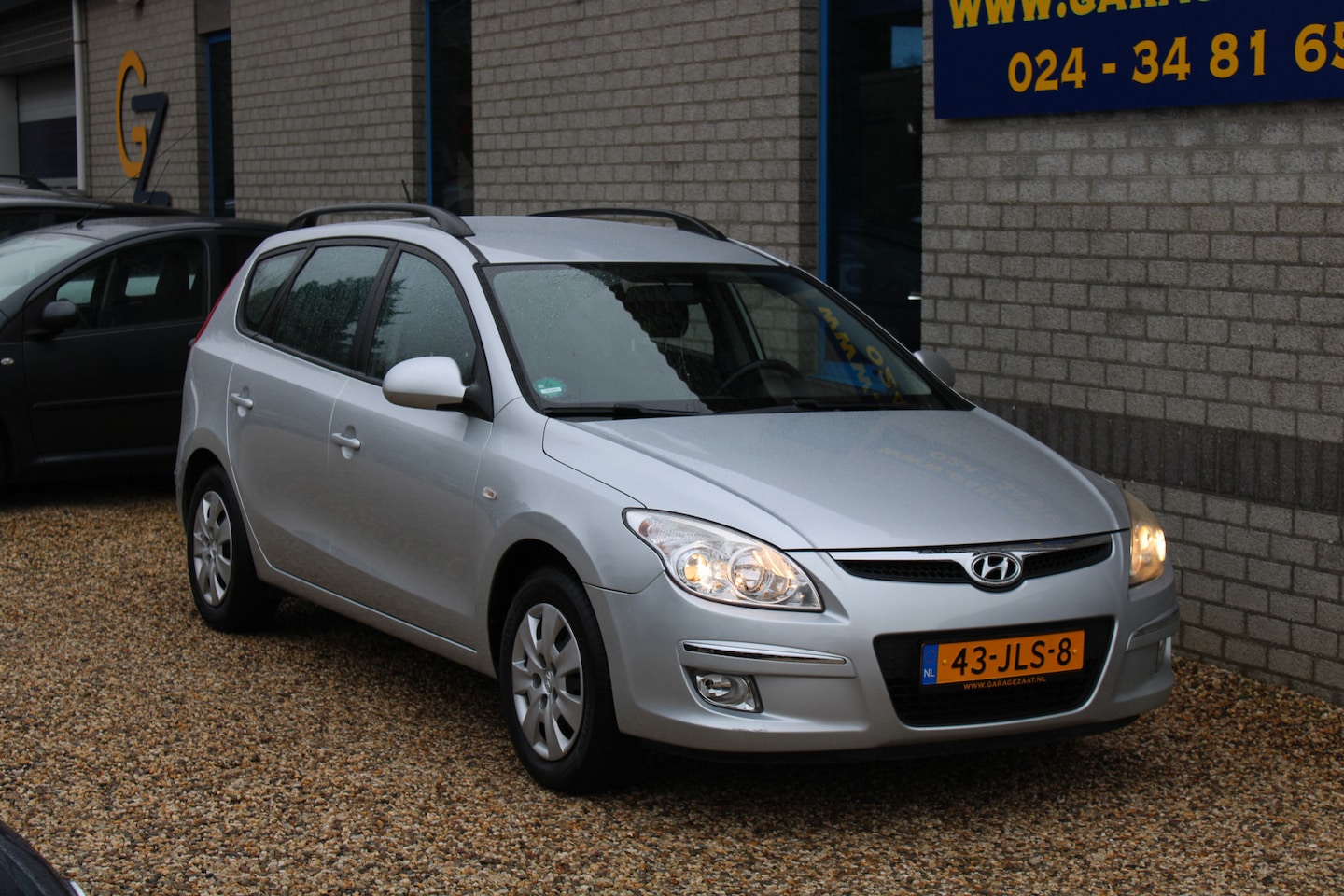 Hyundai i30 CW - 1.6i Dynamic AUTOMAAT Airco PDC Trekh. - AutoWereld.nl