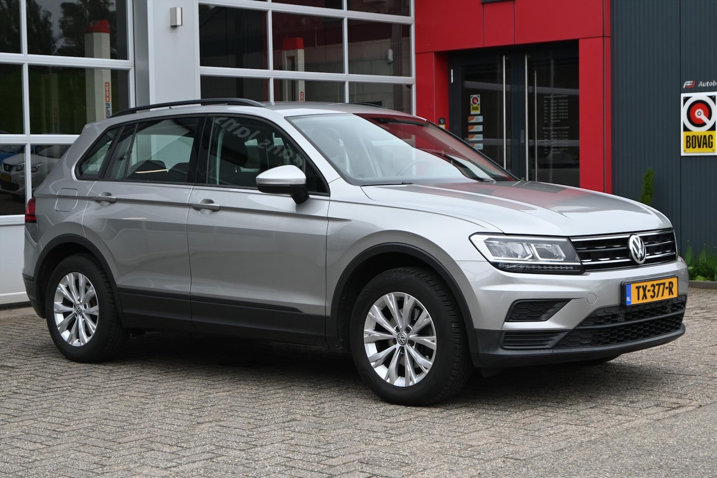 Volkswagen Tiguan - 1.4 TSI 125pk | Trekhaak wegklapbaar | Navi | Stoelverwarming | - AutoWereld.nl