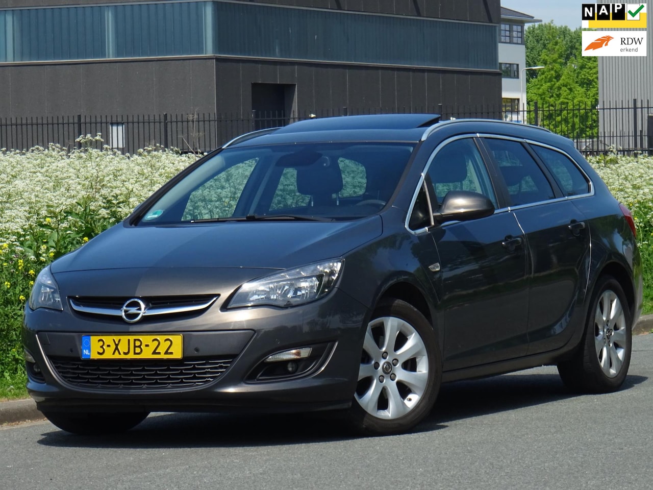 Opel Astra Sports Tourer - 1.6 CDTi NAP/NAVI/OPENDAK/PDC/APK - AutoWereld.nl