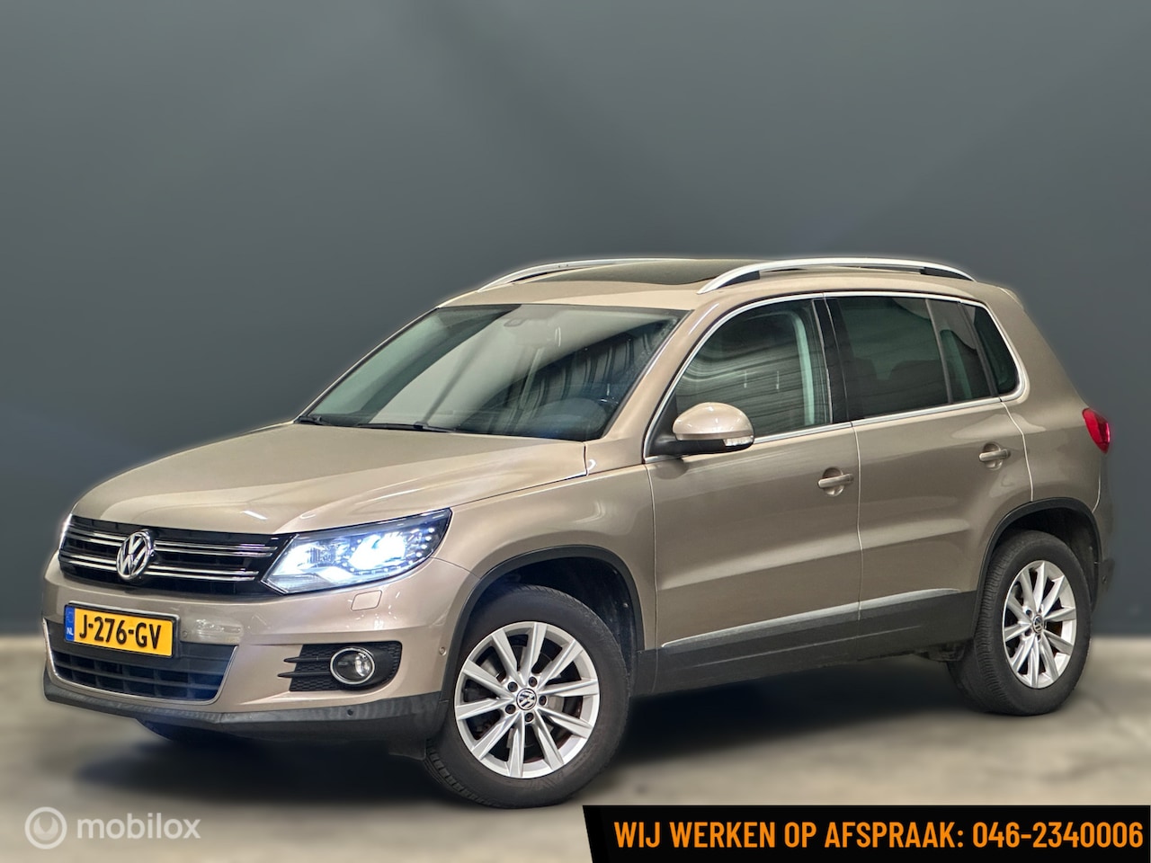 Volkswagen Tiguan - 1.4 TSI Sport&Style Leder Navi Xenon Pano - AutoWereld.nl