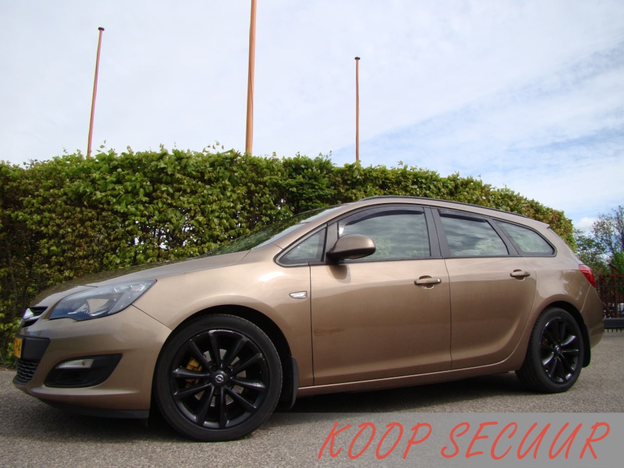Opel Astra Sports Tourer - 1.7 CDTi Business + - AutoWereld.nl