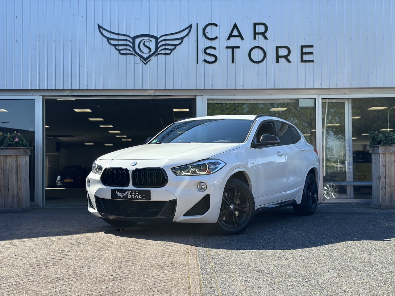 BMW X2 - 2.0i xDrive High Executive |M-SPORT|CAMERA|NAV|LED - AutoWereld.nl