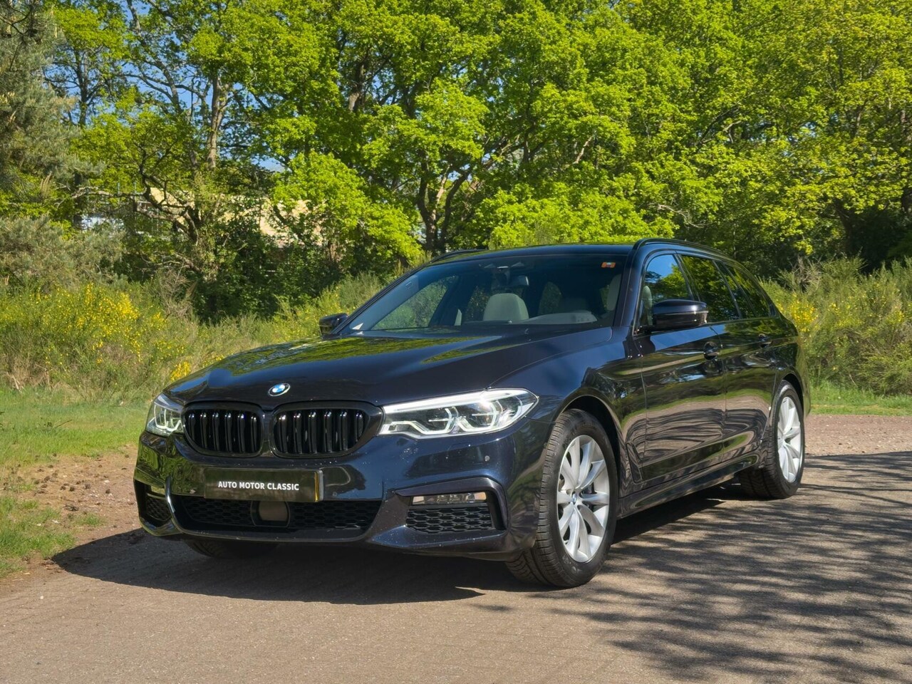 BMW 5-serie Touring - 540i xDrive | M-Sport | Carbon Schwarz - AutoWereld.nl
