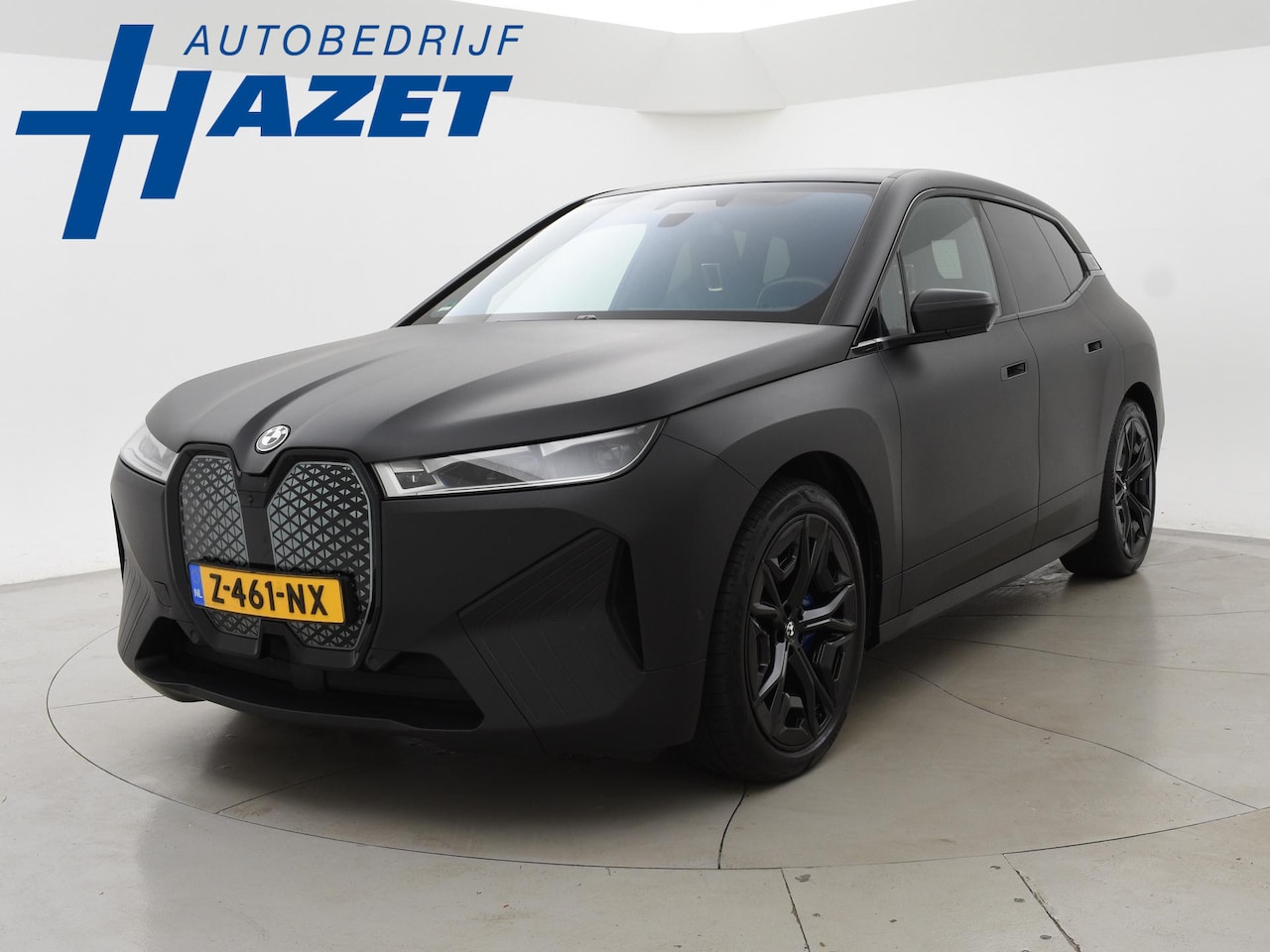 BMW iX - xDrive40 M-SPORT H.E. 77 kWh *MAT ZWART* + 22 INCH | 12-2022 | LASER LIGHT | MASSAGE | 3D - AutoWereld.nl