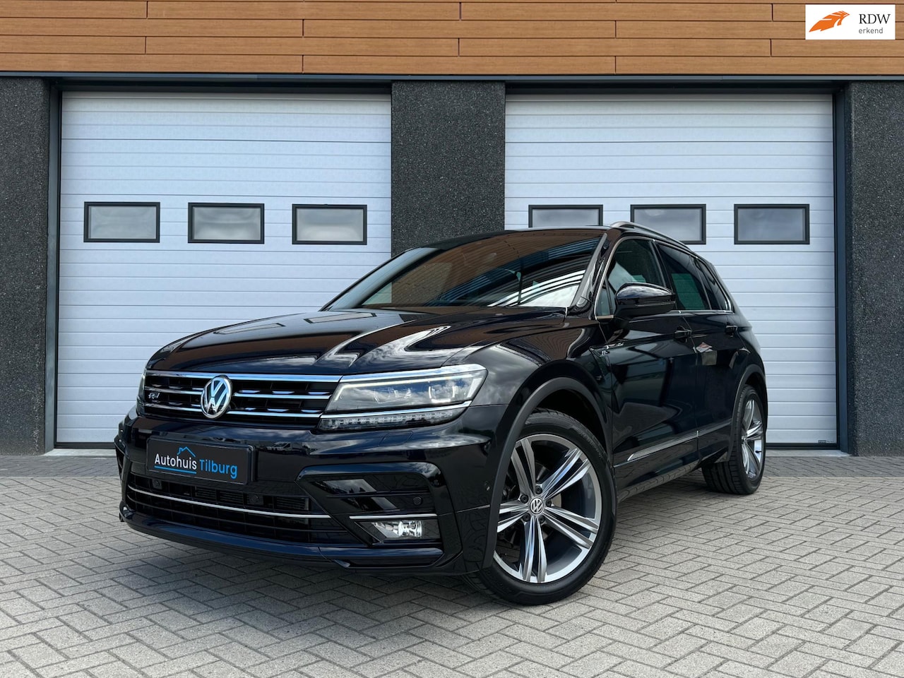 Volkswagen Tiguan - 1.4 TSI 4Motion 3x R-line Pano Leder Trekhaak - AutoWereld.nl