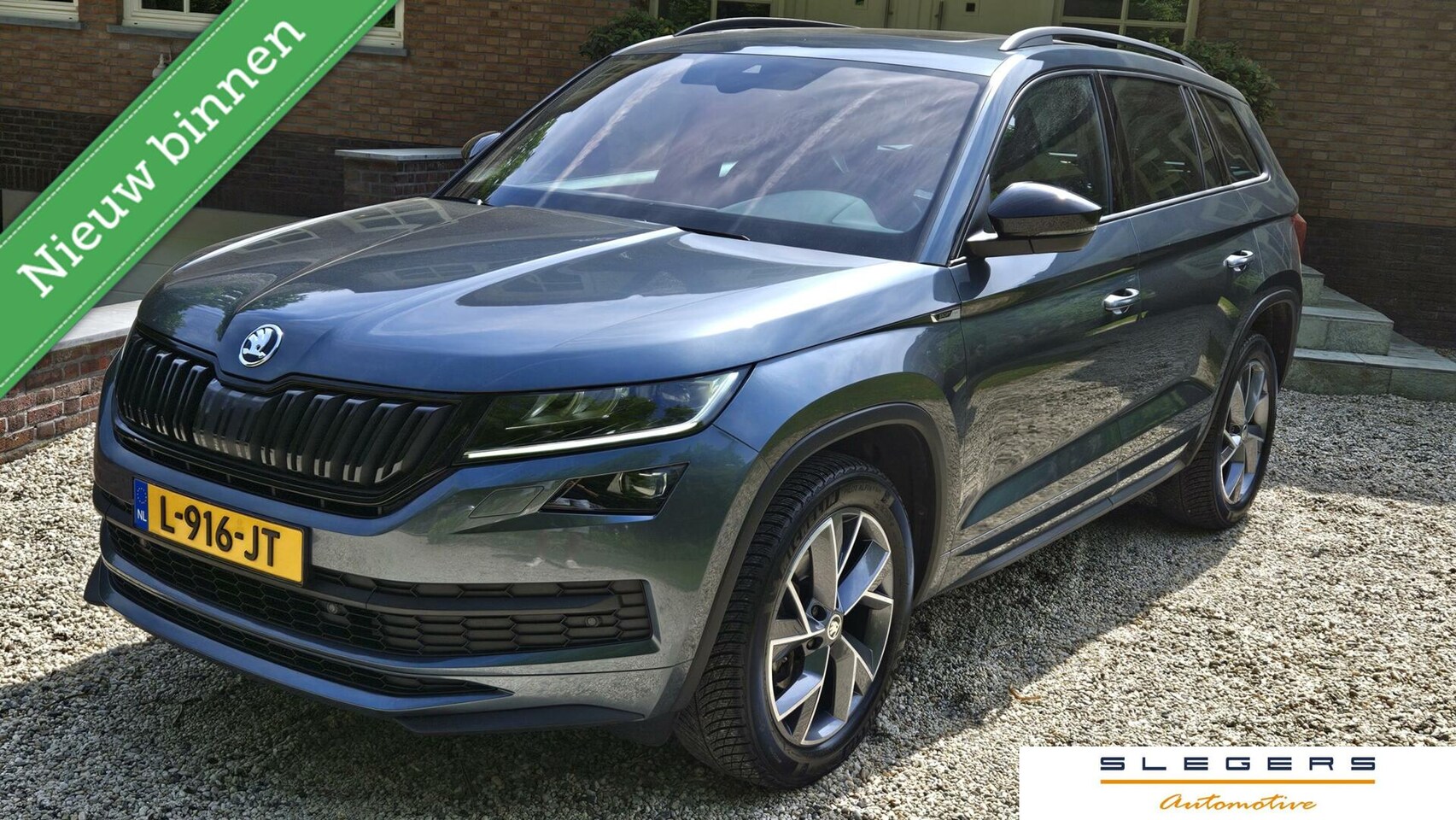 Skoda Kodiaq - 1.5 TSI Sportline Business 7p. Panoramadak Trekhaak - AutoWereld.nl