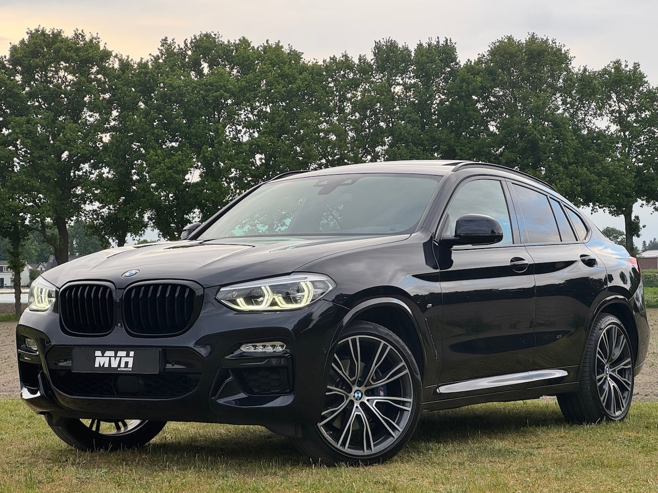 BMW X4 - M40i - M-Pakket - High Executive - Panorama - Leder - 21" Styling 726M - Ambient - HUD - D - AutoWereld.nl