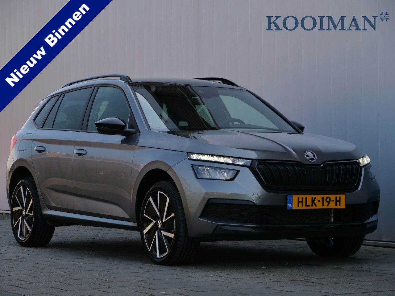 Skoda Kamiq - 1.0 TSI 110pk Sport Business AUTOMAAT Sportstoelen / Panoramadak / LED-koplampen - AutoWereld.nl