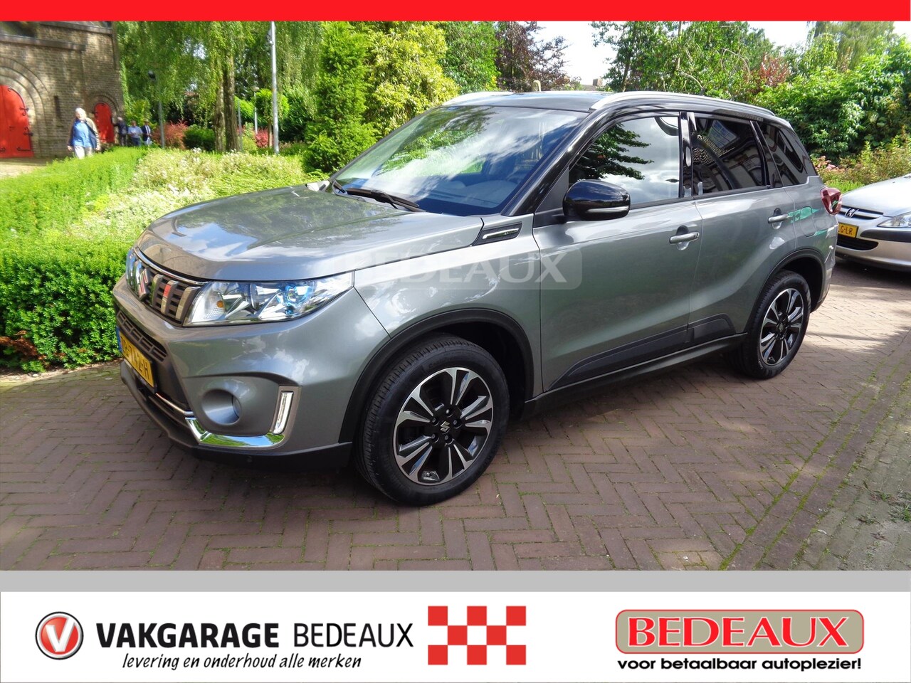Suzuki Vitara - 1.4 Boosterjet 140pk Allgrip Stijl 4x4 (sunroof) bij Vakgarage® - AutoWereld.nl
