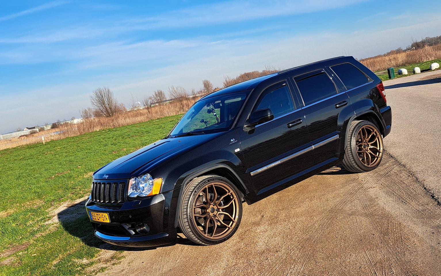 Jeep Grand Cherokee - 6.1 V8 Hemi SRT-8 426 PK - AutoWereld.nl