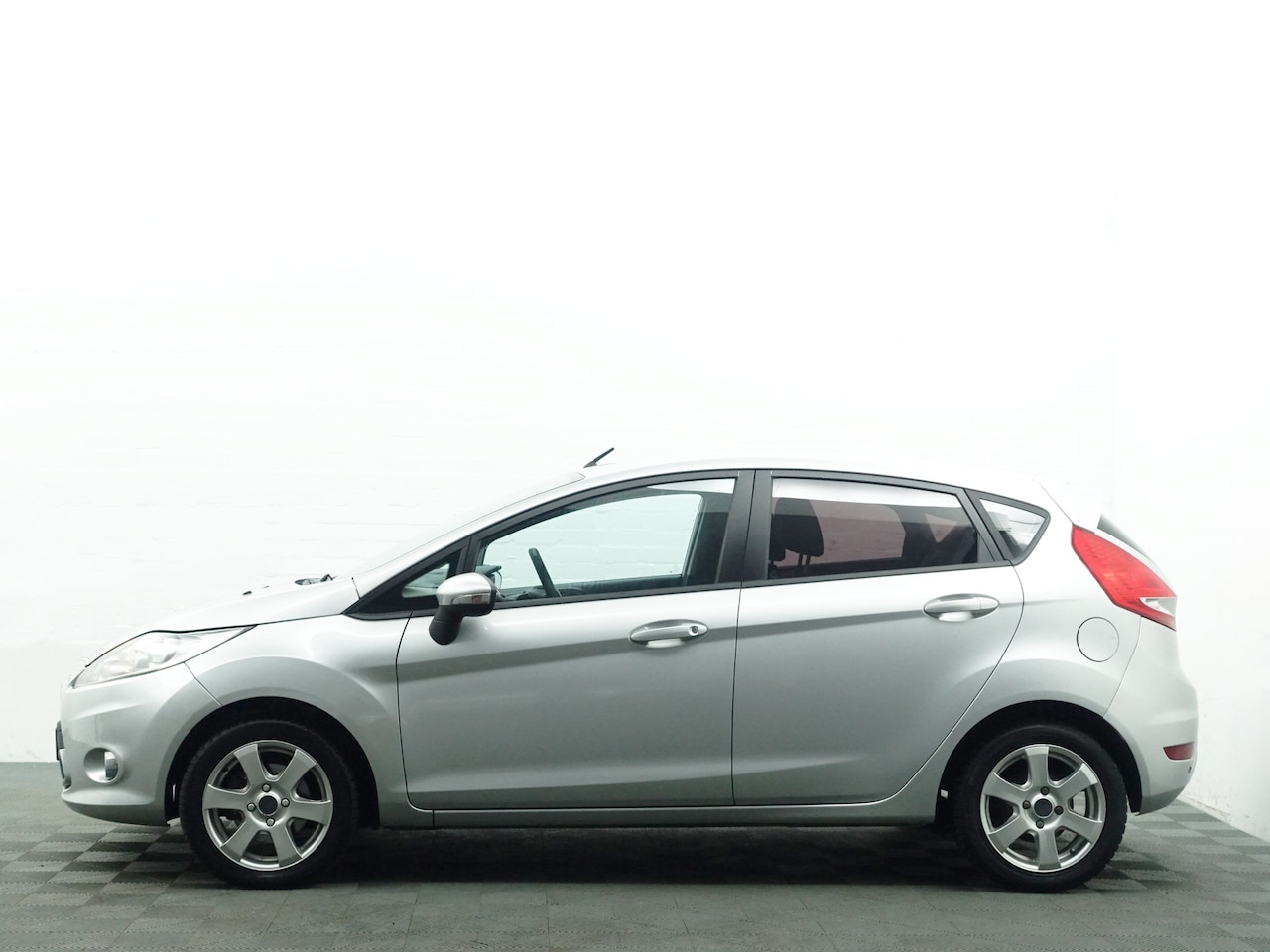 Ford Fiesta - 1.25 Ghia 4x fiesta op voorraad - AutoWereld.nl