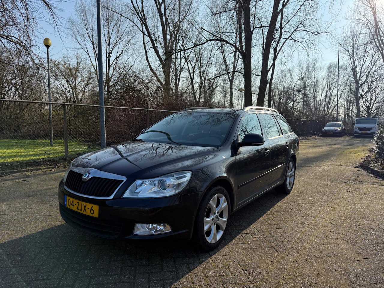 Skoda Octavia Combi - 1.2 TSI Elegance Business Line Cruise Airco PDC - AutoWereld.nl