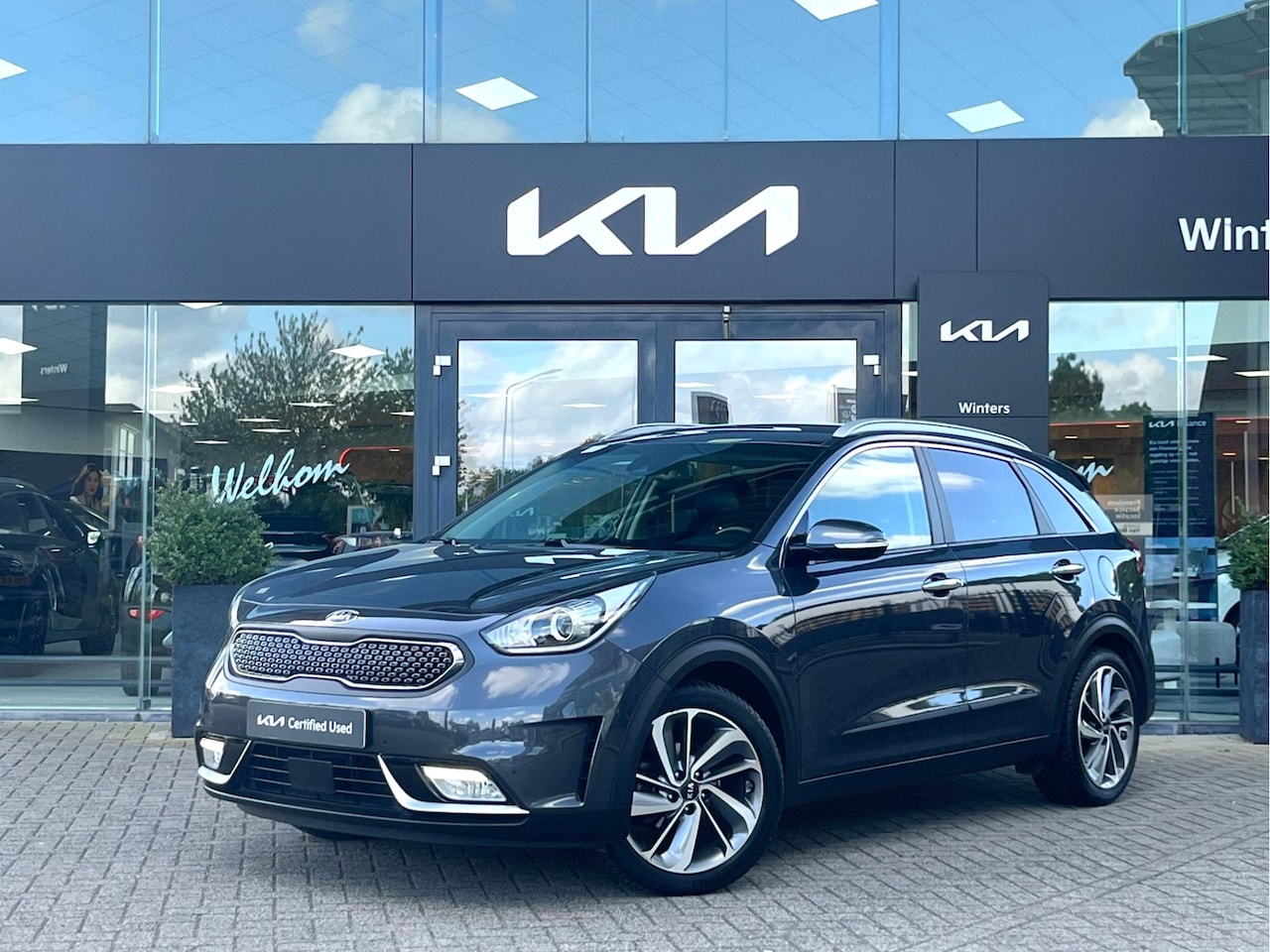 Kia Niro - 1.6i-16V Hybrid Executive DCT6/Autom. ECC Cr.Control-Adapt. Navi+Camera BT+USB Leder+Verw. - AutoWereld.nl