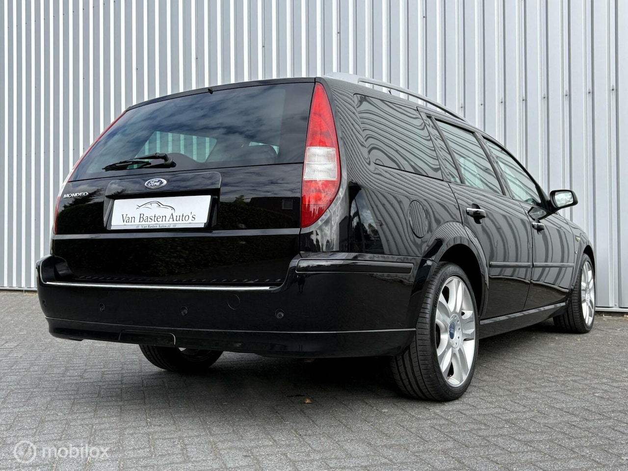 ford-mondeo-wagon-2-5-v6-titanium-aut-pano-youngtimer-pdc-xenon-volledige-historie.jpg