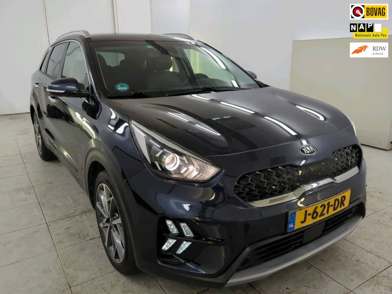 Kia Niro - 1.6 GDi Hybrid DynamicPlusLine+Leder+breed-Navigatie+camera+stuur&stoel-verw+18"lmv KOMT B - AutoWereld.nl