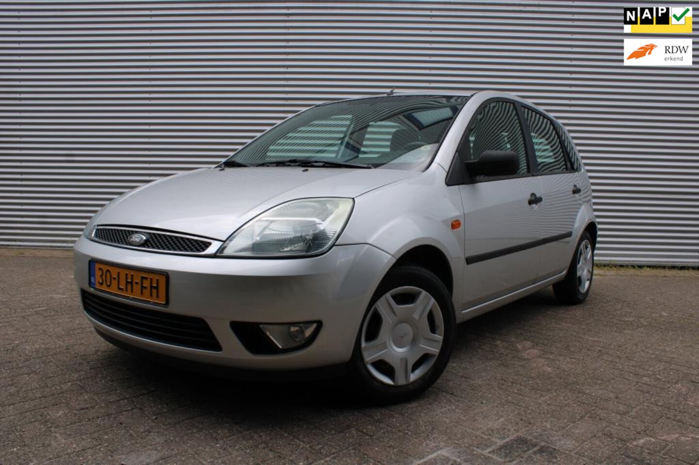Ford Fiesta - 1.4-16V Ghia 1.4-16V Ghia - AutoWereld.nl