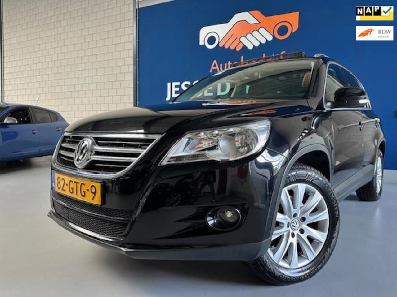 Volkswagen Tiguan - 1.4 TSI Sport&Style 4Motion,panoramadak,leder,climate,trekhaak,stereo,etc.APK tot 01/2026 - AutoWereld.nl