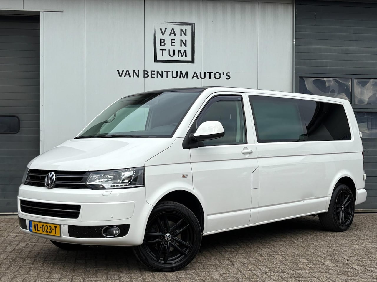 Volkswagen Transporter - 2.0 TDI 140pk Autom. LANG Navi Airco Cruise Leder - AutoWereld.nl