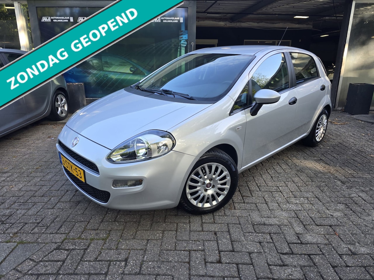 Fiat Punto Evo - 1.2 Pop | 2E EIGENAAR | 12 MND GARANTIE | LAGE KM STAND | AIRCO | NW APK | - AutoWereld.nl