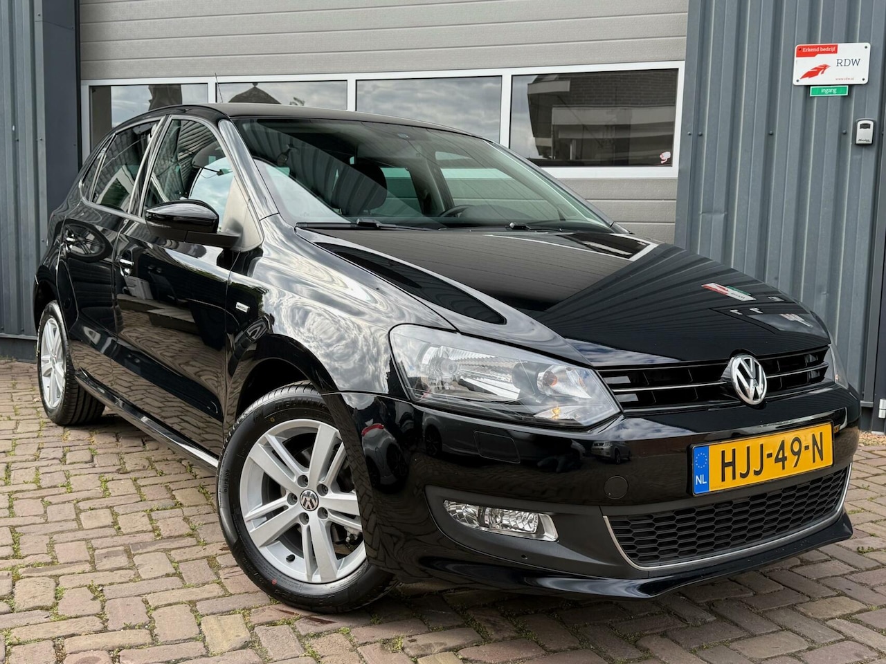 Volkswagen Polo - 1.2 12V Highline / Cruise / PDC / Match - AutoWereld.nl