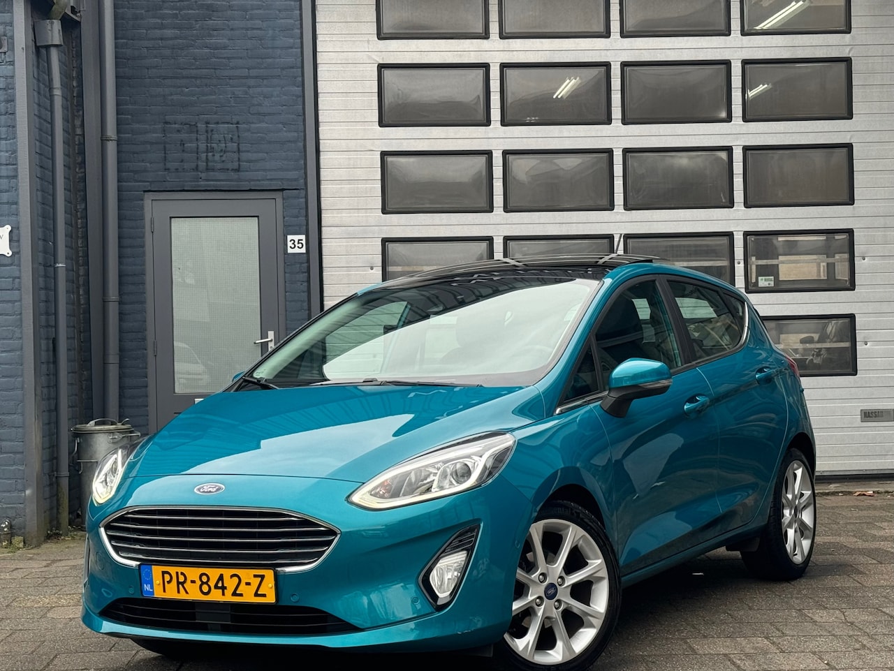 Ford Fiesta - 1.0 EcoBoost Titanium | Clima | Camera | Pano | ACC | N.A.P - AutoWereld.nl