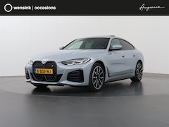 BMW i4 - eDrive40 84 kWh M-Sport | SOH 99% | Schuif/Kanteldak | Trekhaak Ele.wegklapbaar | Sportsto