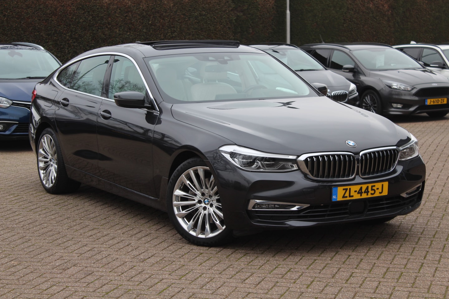 BMW 6-serie Gran Turismo - 630i High Exe. Edition 68.661 km! / Panoramadak / 360Camera / Head-up / Luchtvering / 20'' - AutoWereld.nl