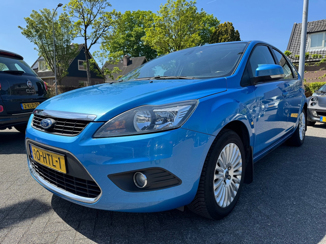 Ford Focus - 1.6 Titanium Apk 15/3/26,Airco,Cruise,Navi,Trekhaak - AutoWereld.nl