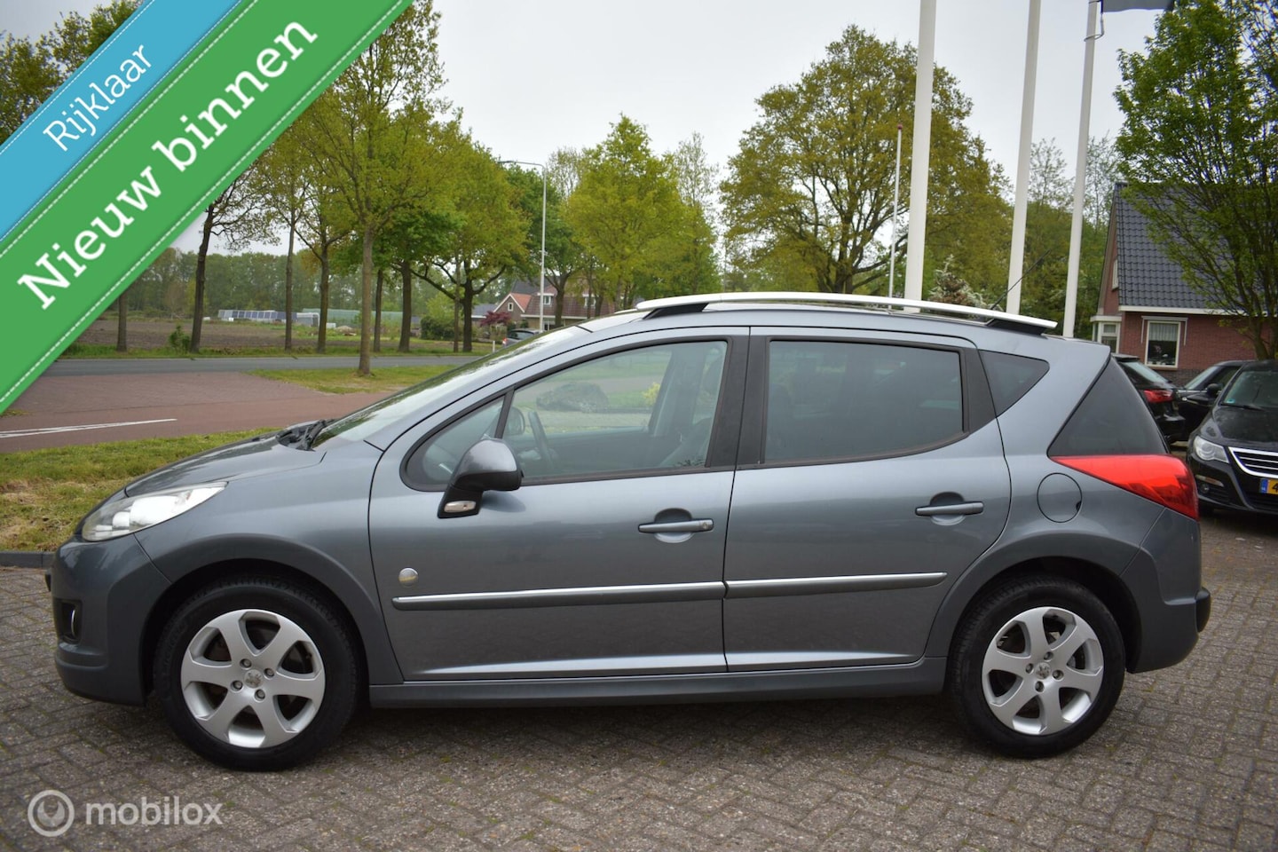 Peugeot 207 SW Outdoor - 1.6 VTi 2010 Airco|Panodak|61049 km!! - AutoWereld.nl
