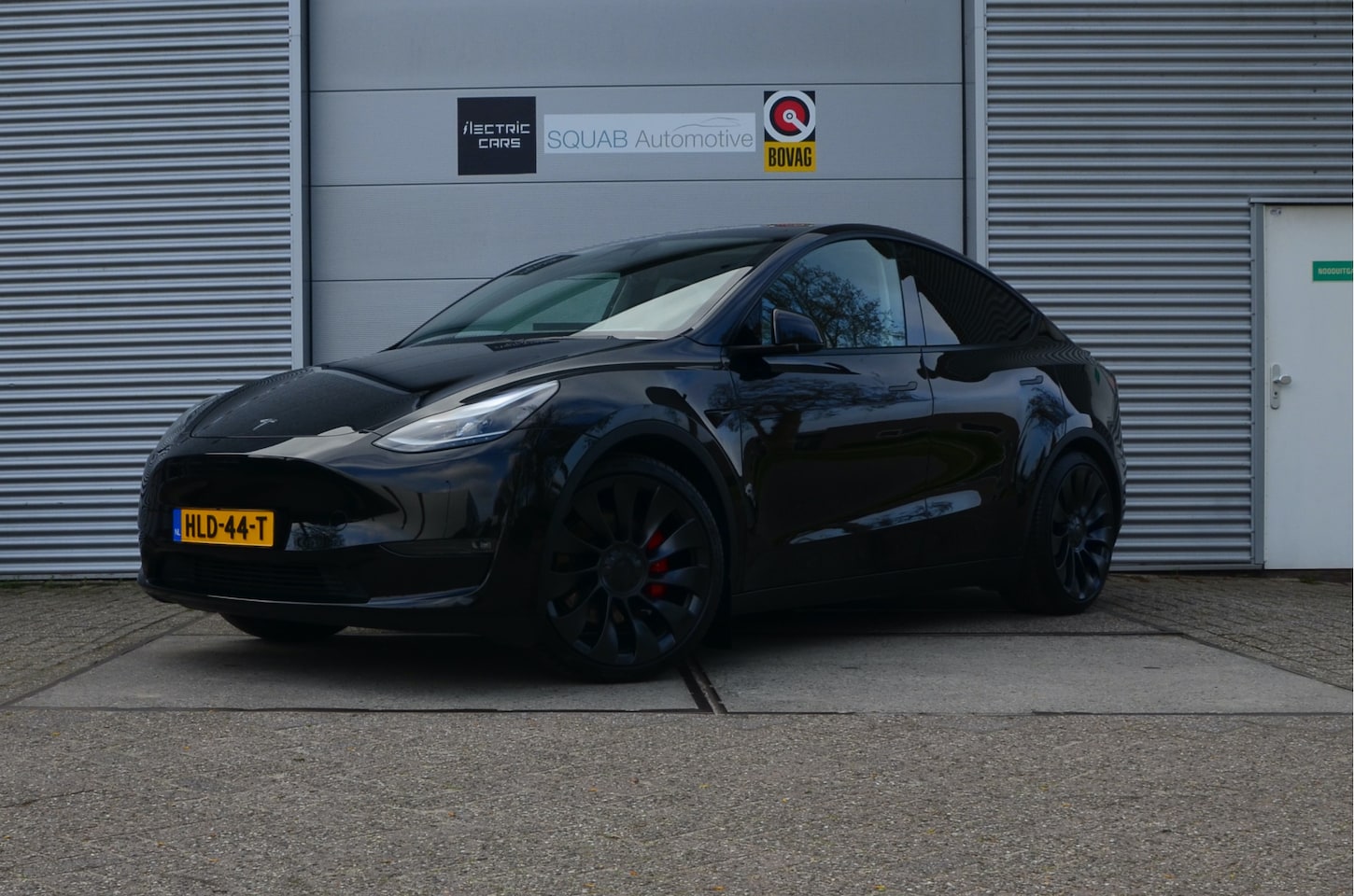 Tesla Model Y - Performance AWD 75 kWh Trekhaak (1.600kg), AutoPilot - AutoWereld.nl