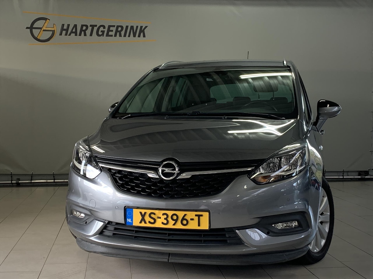 Opel Zafira Tourer - 1.4 Turbo 140pk Automaat Online Edition *7-Pers* Navi / Cruise / PDC / LMV / Camera - AutoWereld.nl