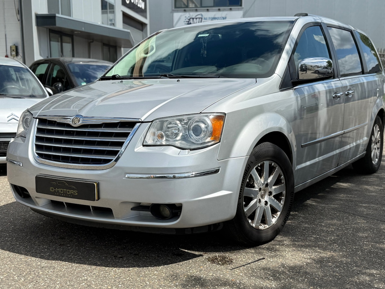 Chrysler Grand Voyager - 2.8 CRD navi velgen scherm vol optie - AutoWereld.nl