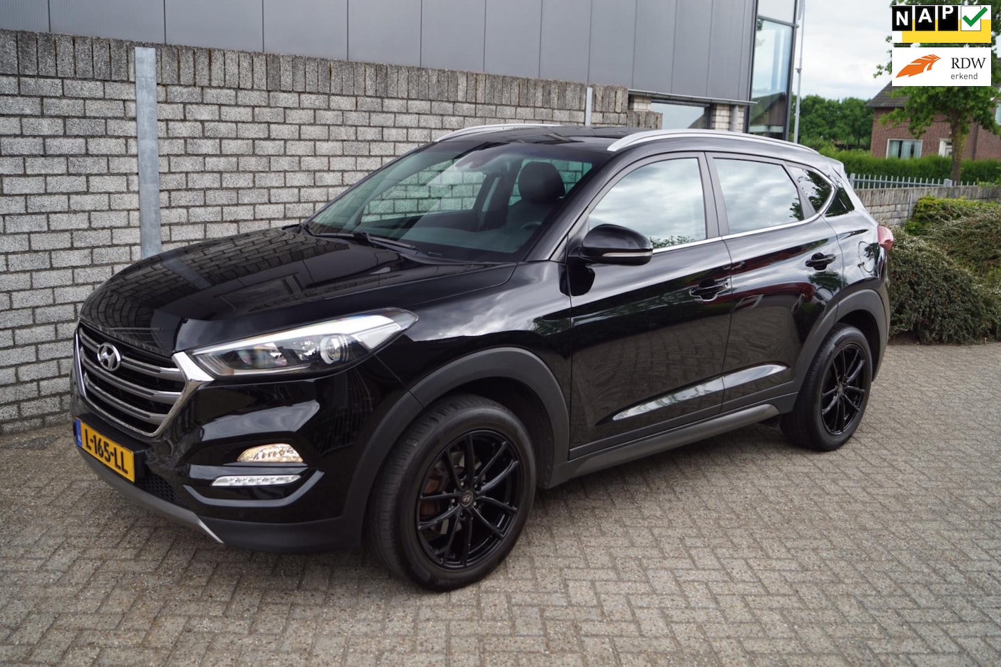 Hyundai Tucson - 1.6 GDi Comfort Premium Leder Stoel/A Bankverw Elektrische Stoelen Navi Camera Clima Cruis - AutoWereld.nl