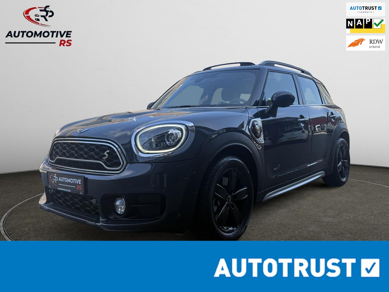 MINI Countryman - Cooper S E ALL4 Hybride 224pk – Luxe | 4x4 | Panodak | Navi | Leder | Topstaat! - AutoWereld.nl