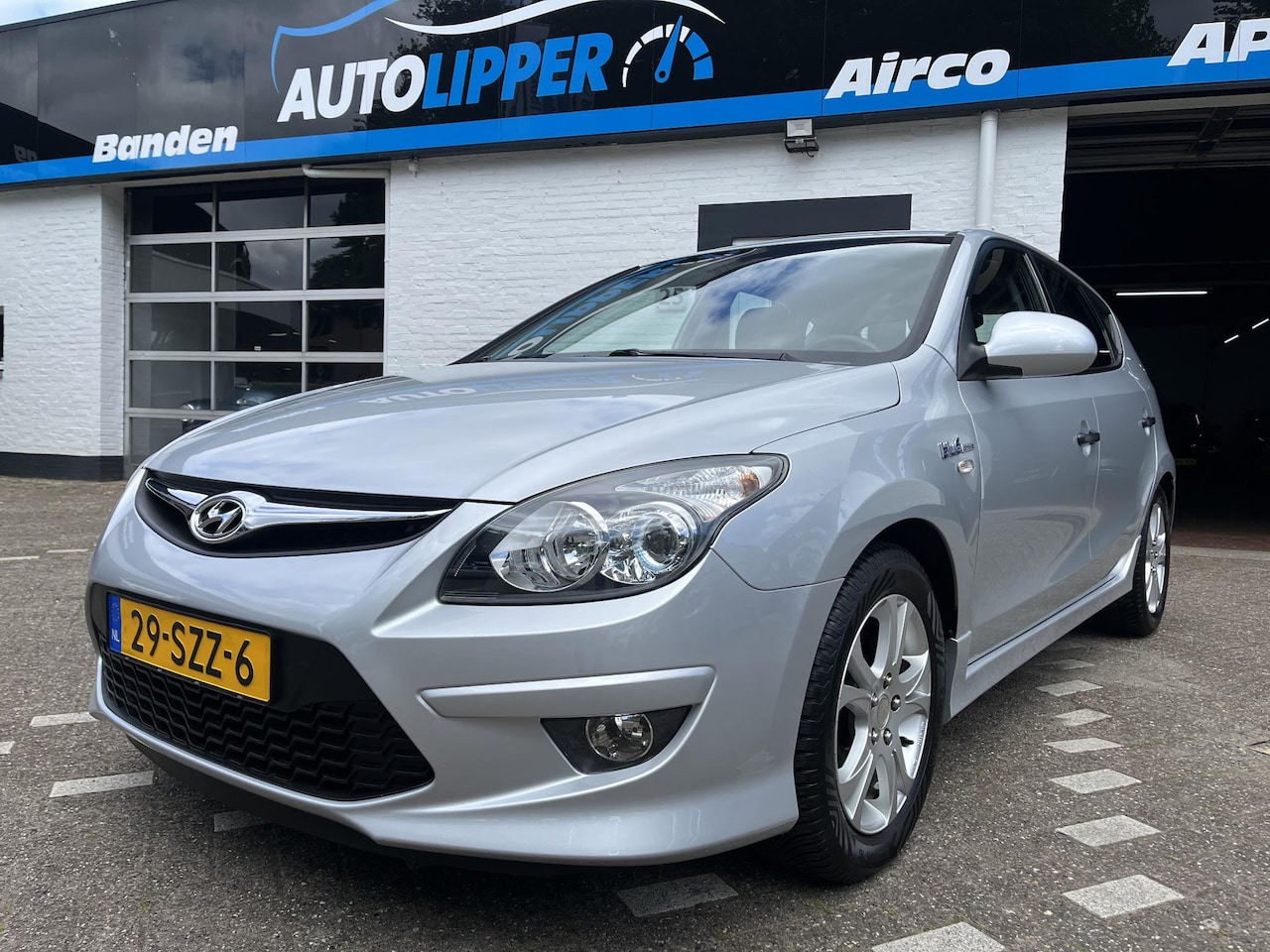 Hyundai i30 - 1.4i i-Drive Cool /Airco/Trekhaak/Lm velgen/All season banden/1e eigenaar - AutoWereld.nl