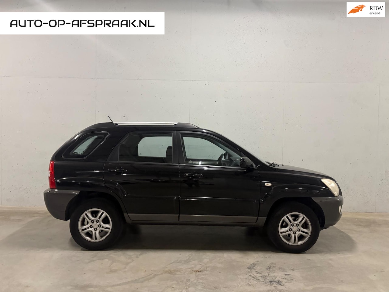 Kia Sportage - 2.0 CVVT Comfort Airco APK NAP - AutoWereld.nl