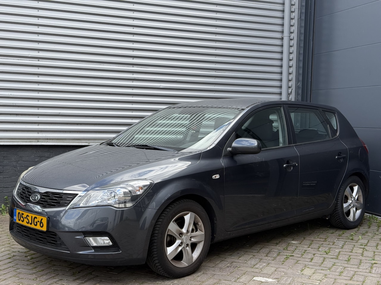 Kia Cee'd - 1.4 CVVT Seven // AIRCO // CAMERA // TREKHAAK - AutoWereld.nl
