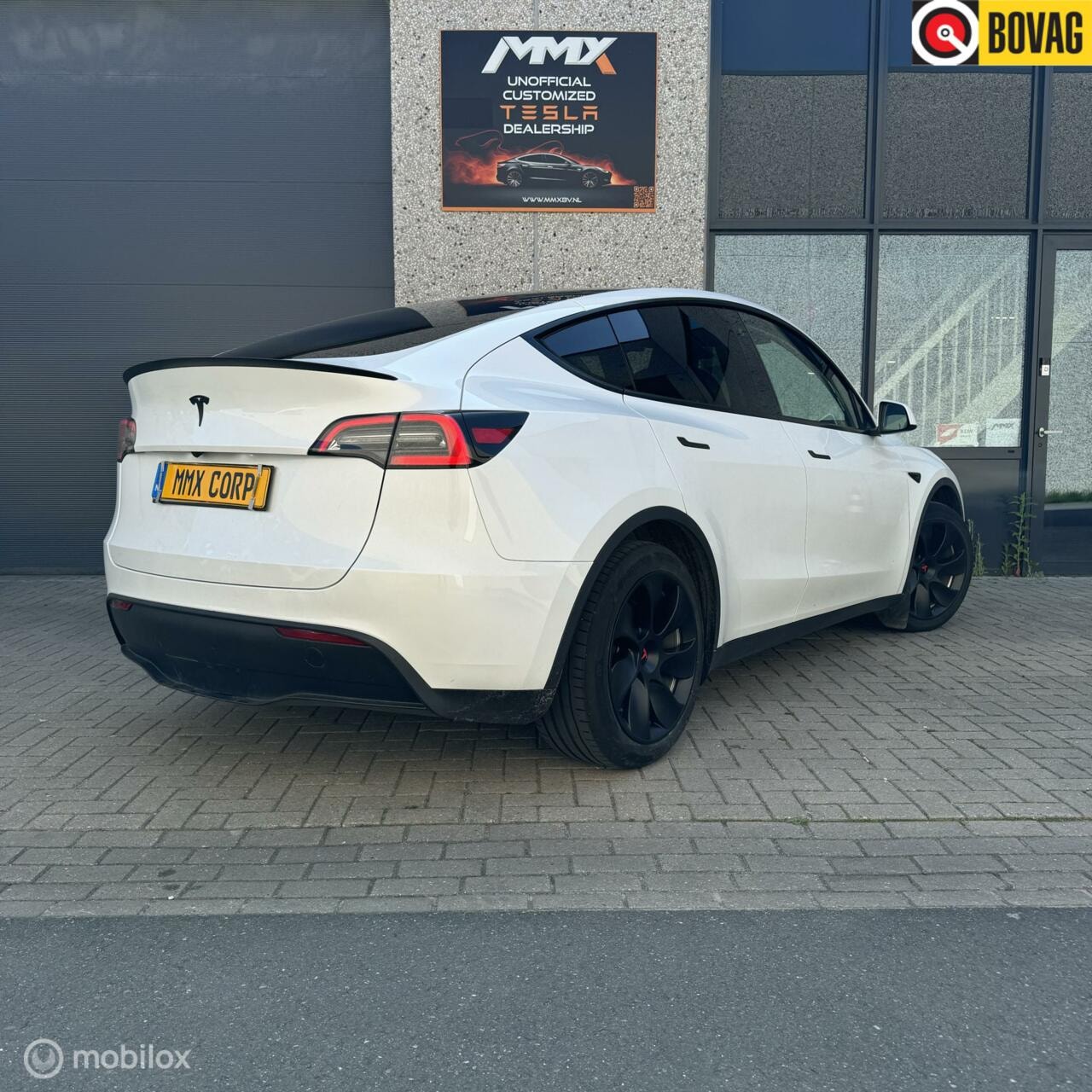 Tesla Model Y - Long Range RWD MiG Wit 78KWH MMX PACK - AutoWereld.nl