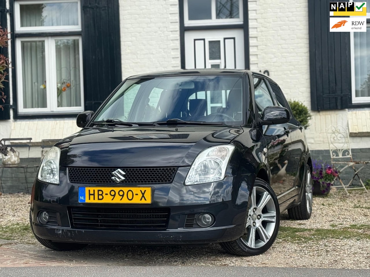 Suzuki Swift - 1.3 Bandit|Keyless|Clima|5DRS|Stoelverwarming| - AutoWereld.nl