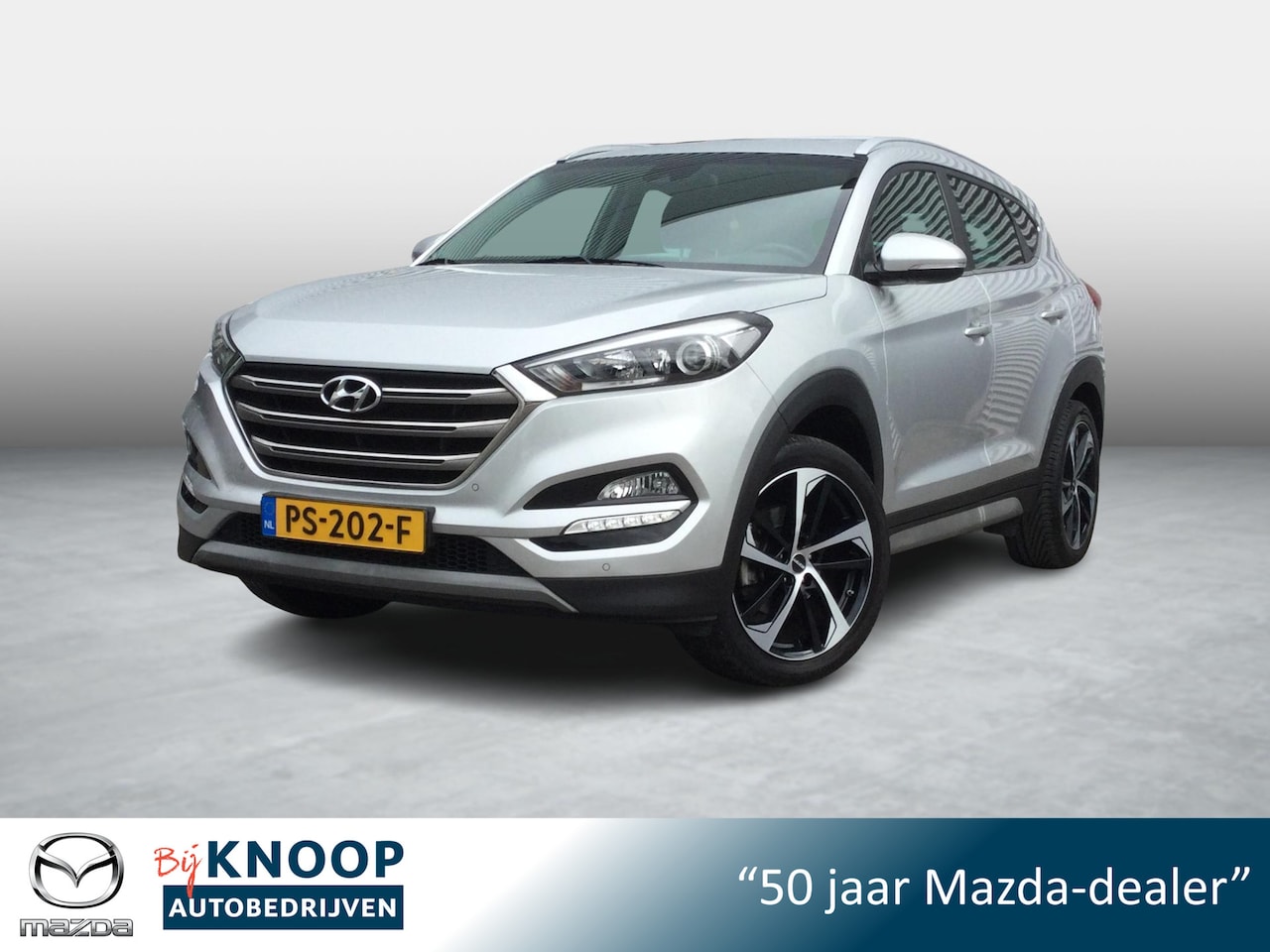 Hyundai Tucson - 1.6 GDi Comfort | Trekhaak | Camera | Navi | CruiseControl | - AutoWereld.nl