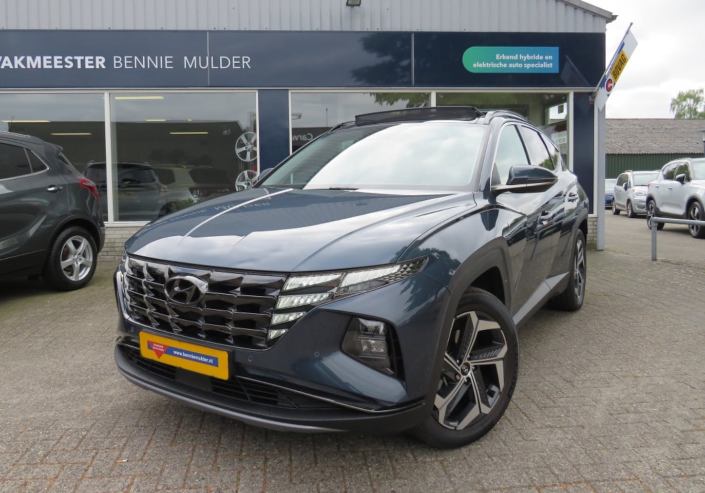 Hyundai Tucson - 1.6 GDi PHEV NAVI / CAMERA / ADAP. CRUISE / SCHUIFDAK - AutoWereld.nl
