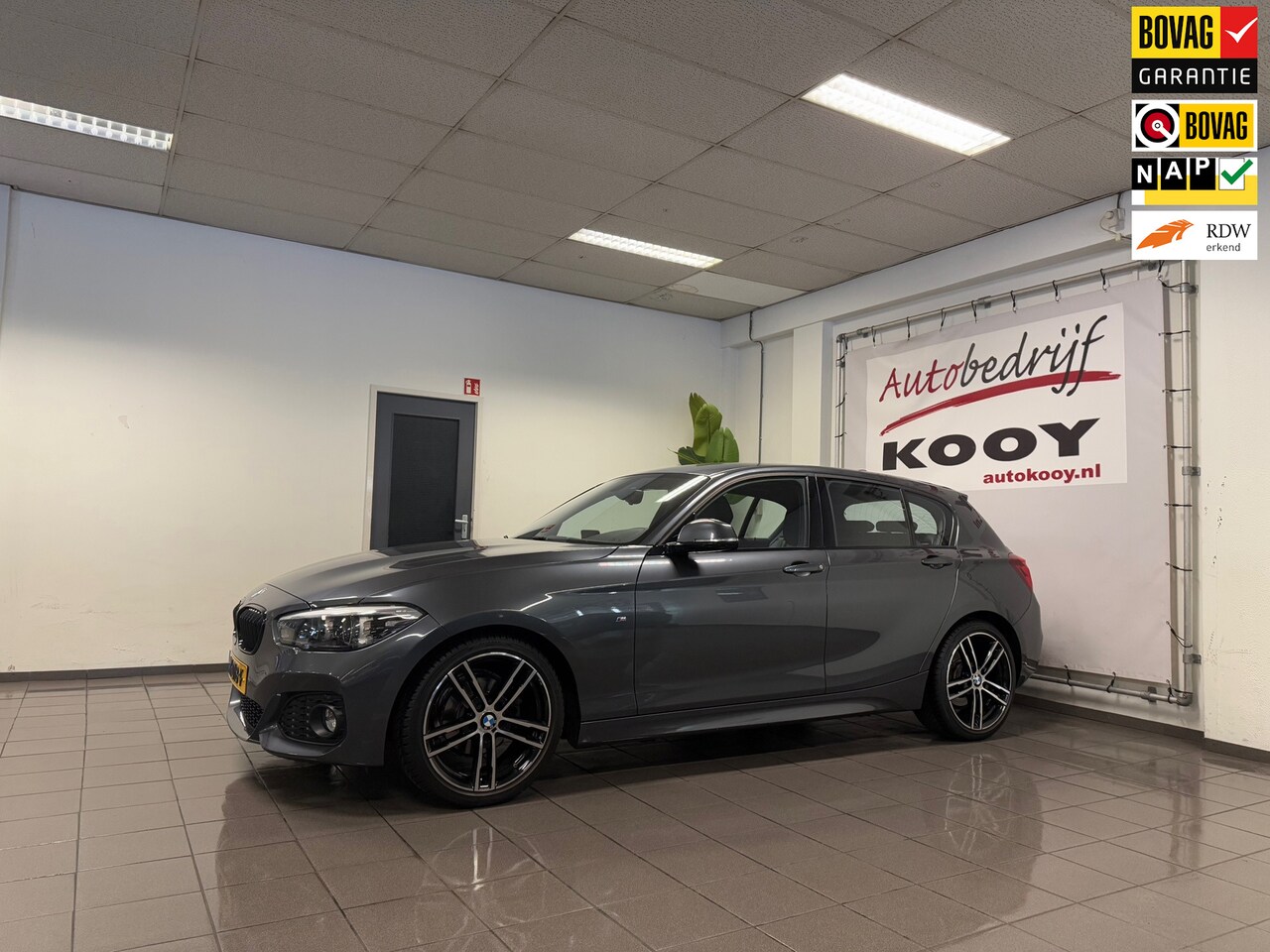 BMW 1-serie - 118i Edition M Sport Shadow High Executive * Automaat / Navigatie / Leder / NL Auto * - AutoWereld.nl